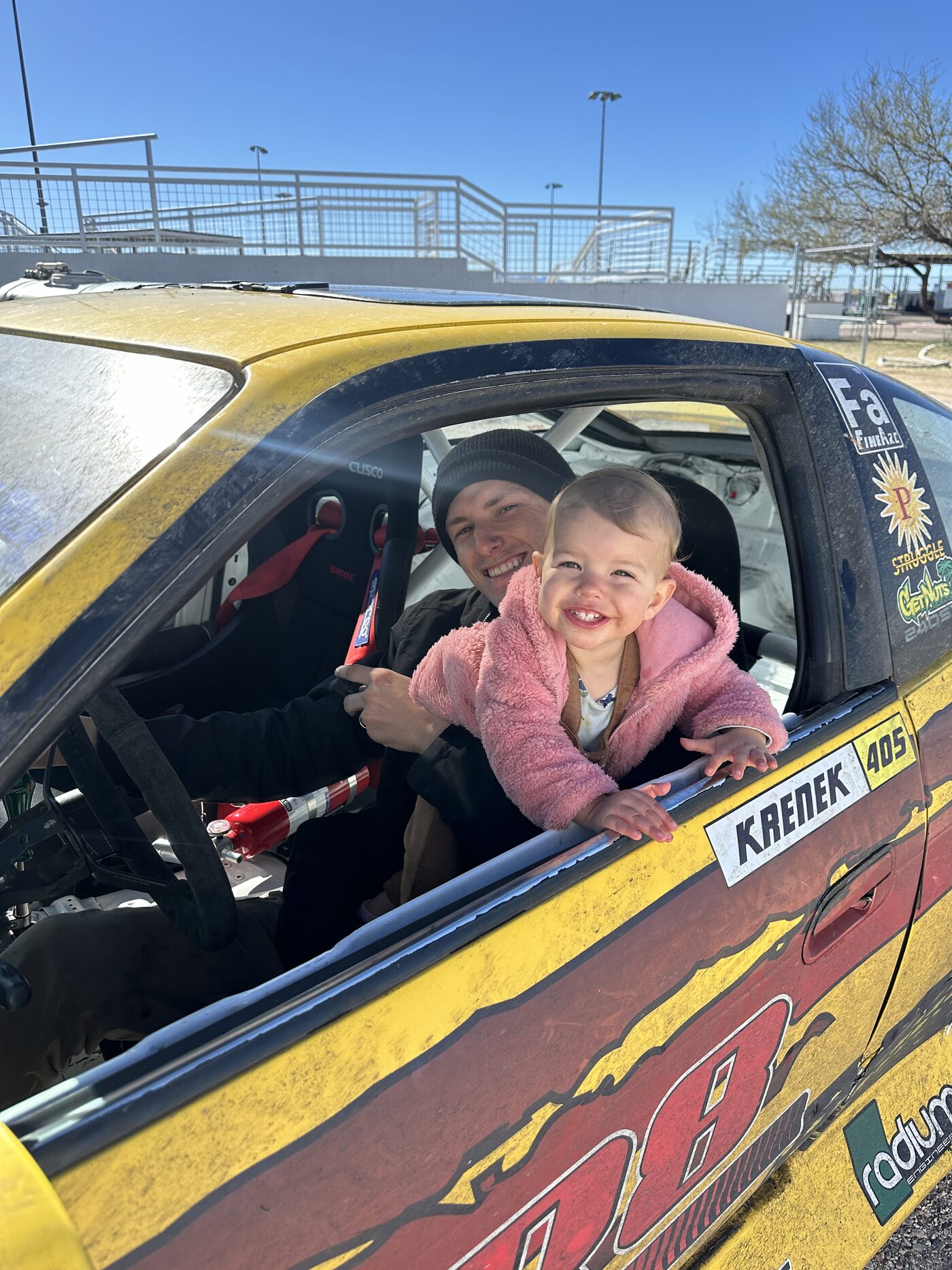 Tyler and his daughter in the XLR8 car