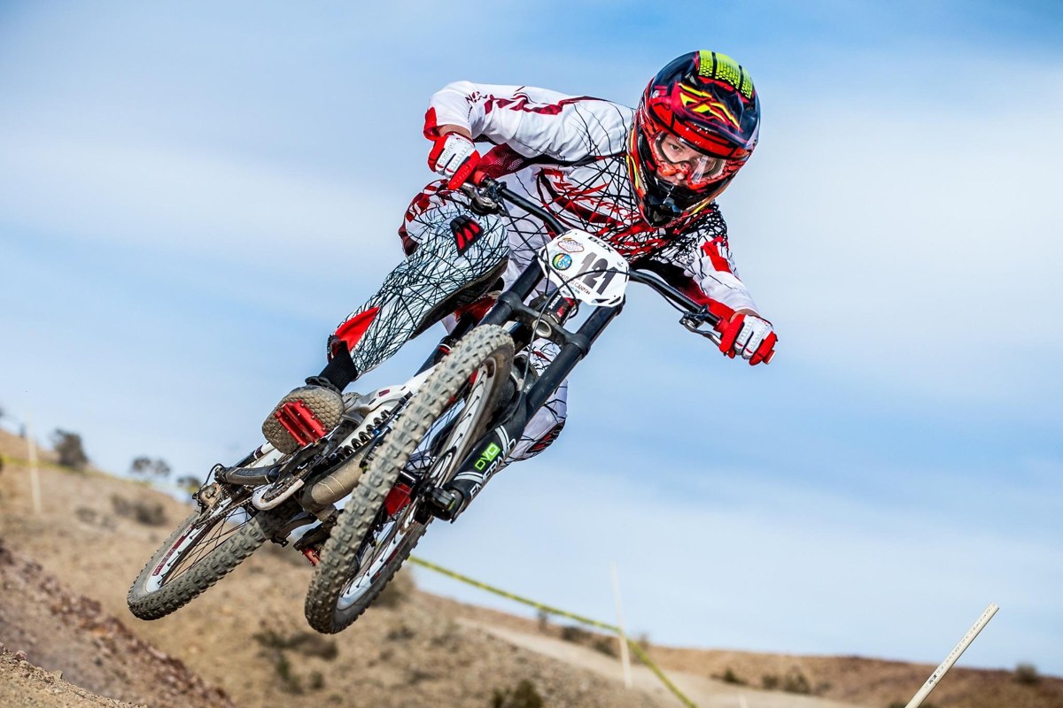 Tyler Krenek racing downhill on a mountain bike